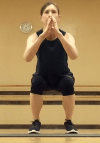 mini band squat instructions