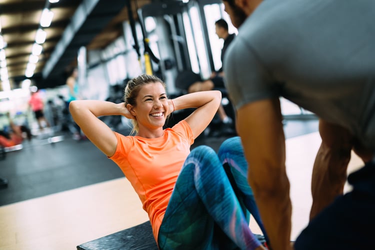 Woman Working Out Orange Shirt